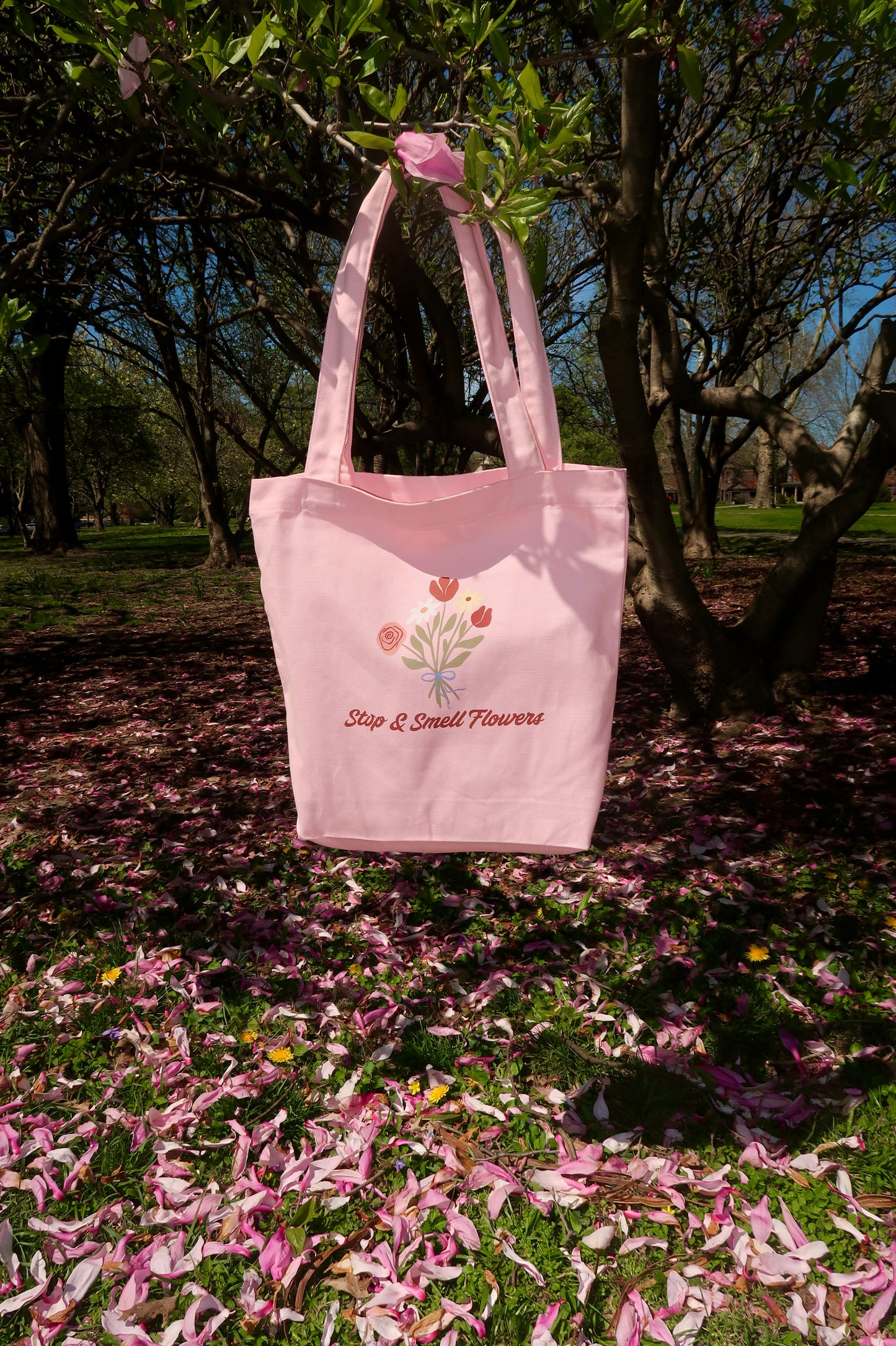 Stop & smell flowers pink tote bag
