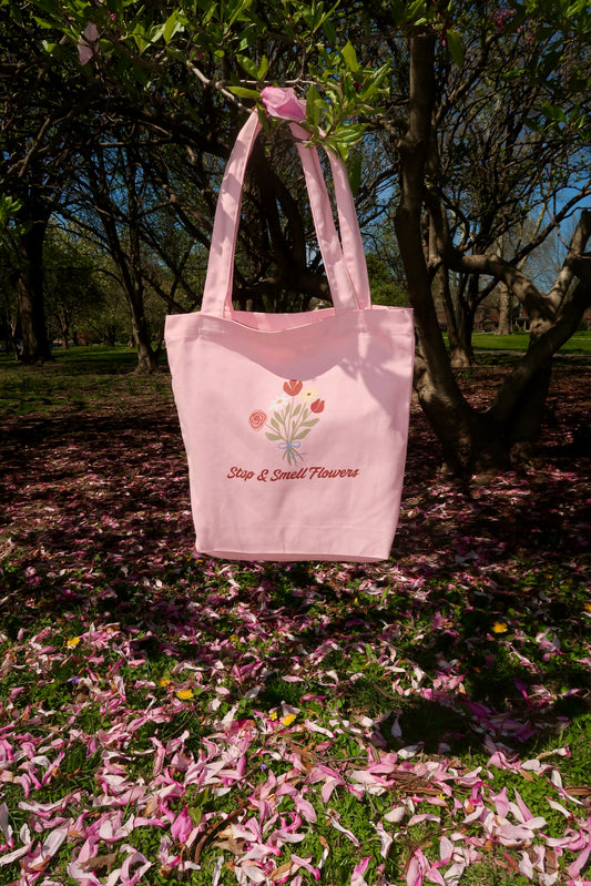 Stop & smell flowers pink tote bag